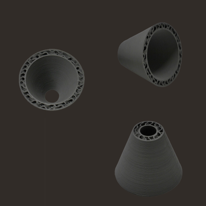 échangeur de chaleur en acier inoxydable Pollen AM mim métal cim céramique technique impression 3D imprimante 3D granulés industriels extrusion petite série moyenne série acier inoxydable granulés thermoplastiques ouvert aux matériaux multi-matériaux