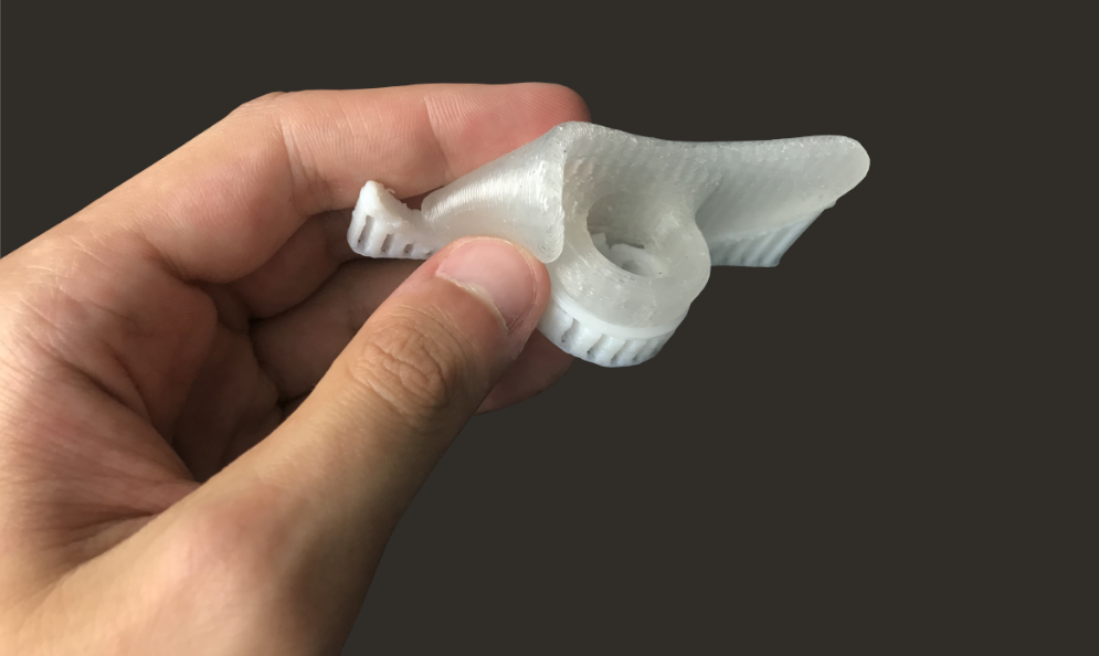 FGF Fused Granulate Fabrication FGM Fused Granulate Modeling Bimaterial toe separator Pollen AM  elastomer 3D Shore 00 HIPS printing 3D printer industrial pellets granules extrusion small series medium series thermoplastic granules open to materials multi-material